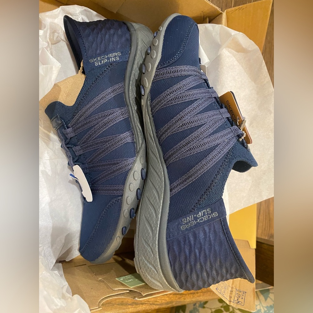 New pair of Skechers Women’s Navy Slip-On Athletic Shoes
